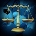 Sports law concept with sport equipment and a legel scale of justice symbol as an icon for amateur and professional sport contract dispute or athlete arbitration procedures for baseball basketball football soccer and hockey for the sporting industry.